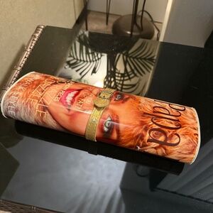 Magazine print clutch with chain strap